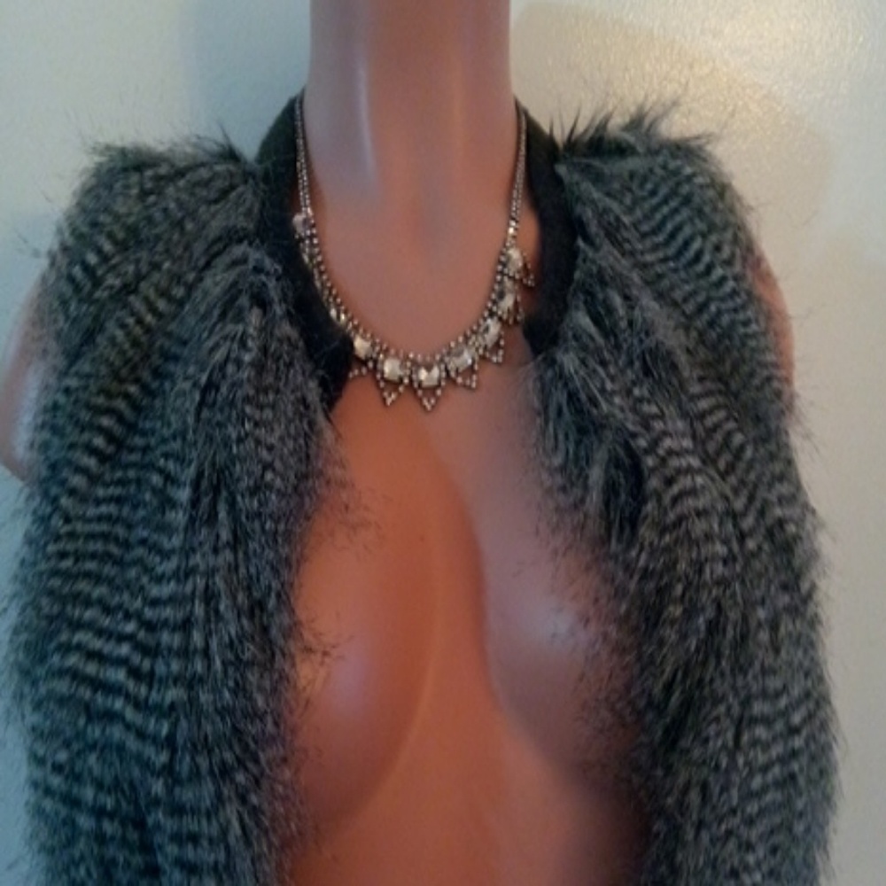 Grey and black fringe vest.